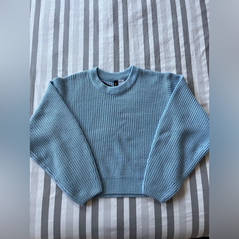blue ribbed sweater